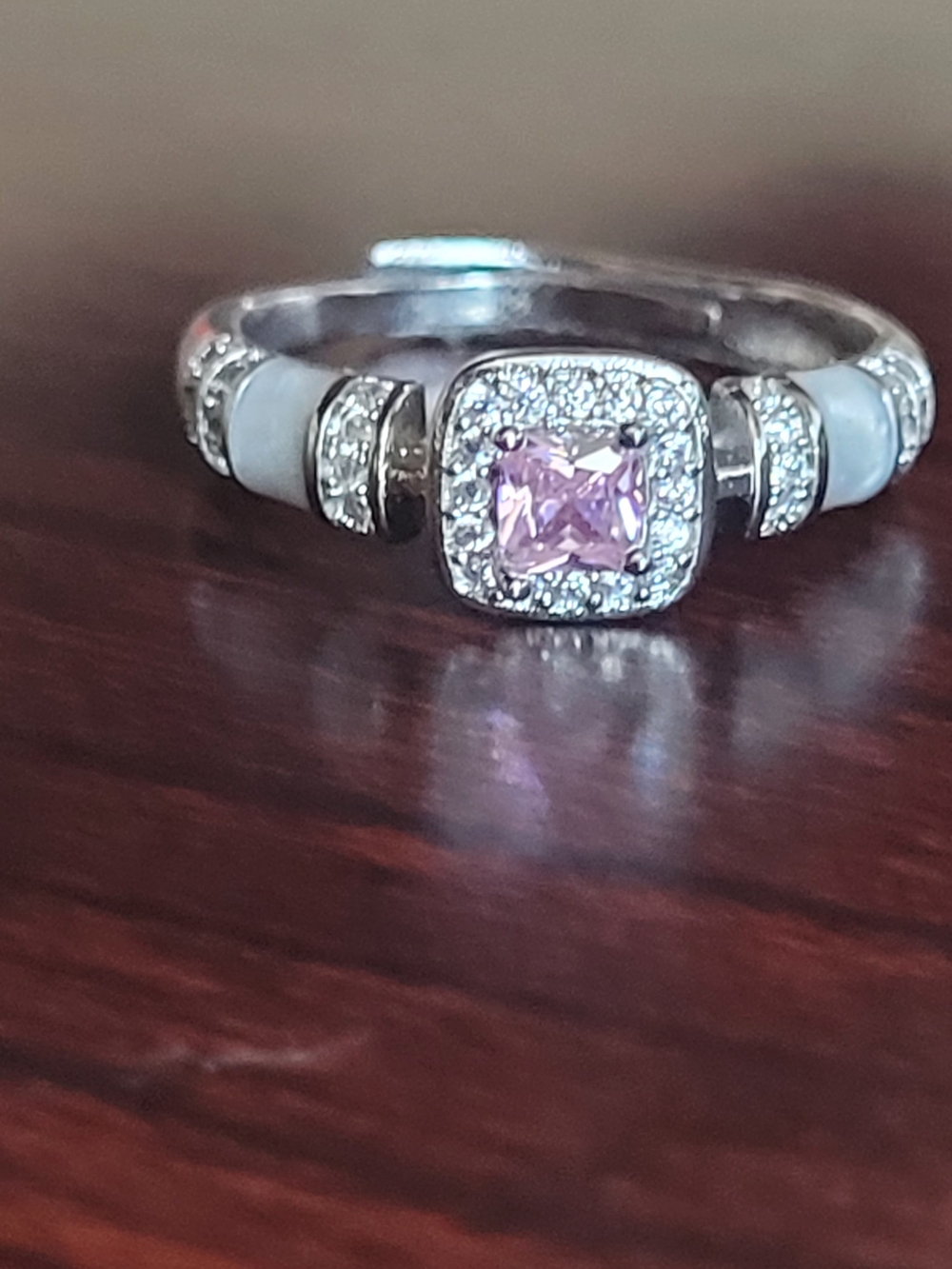 Elegant Pink Cubic Zirconia Halo Ring with White Enamel Accents